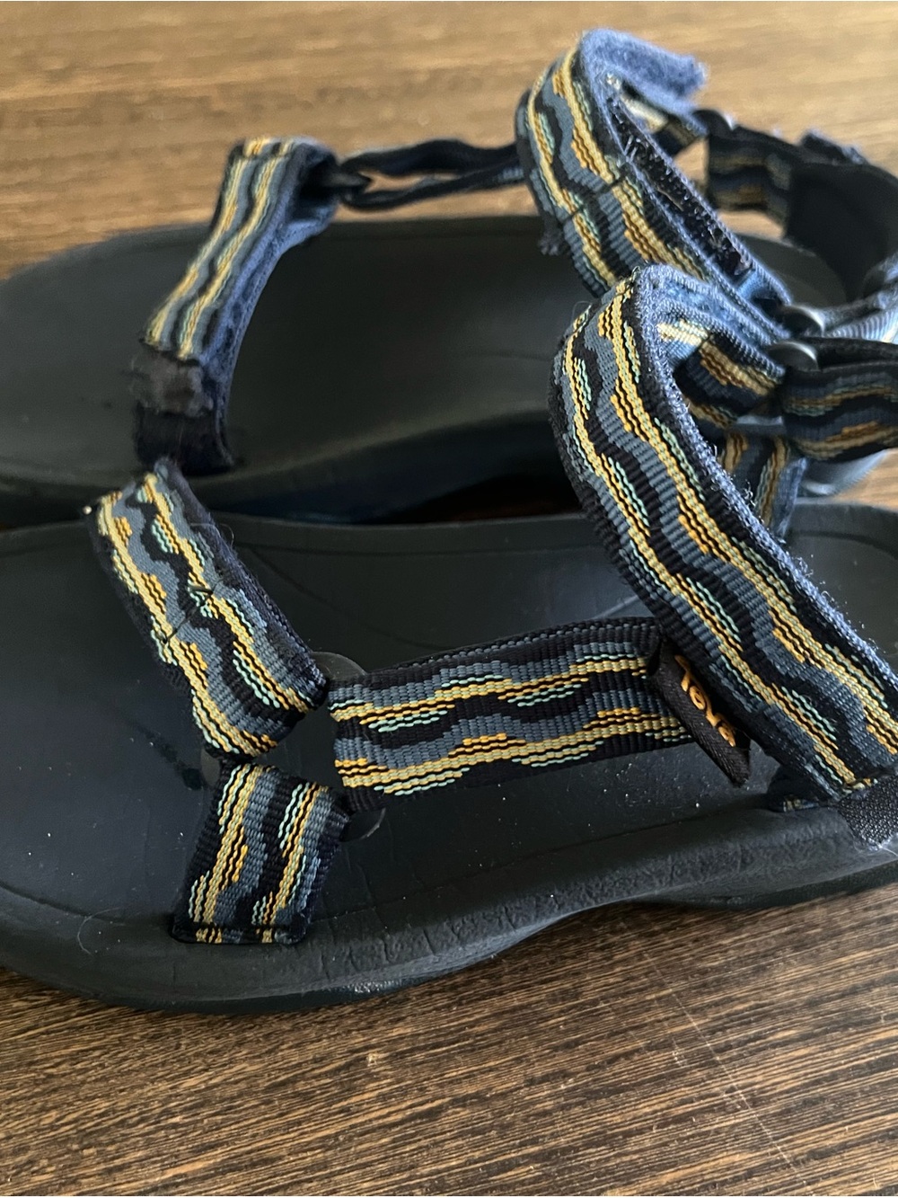 Teva Kids Black Sandals with Blue and Yellow Straps
